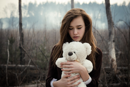 Teen girl holding tey bear 4