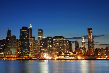 New york city manhattan skyline at dusk over hudson river with skyscrapers
