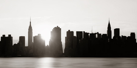 New york city skyscrapers silhouette urban view at sunrise Stock Photo