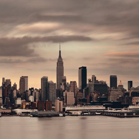 Manhattan midtown skyscrapers and new york city skyline at sunset Stock Photo