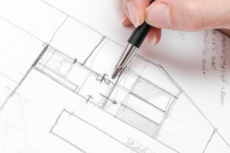 Architect Hand Drawing House Plan Sketch With Pencil - 36991947