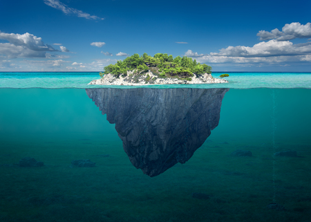 idyllic underwater view of lone small island above and below