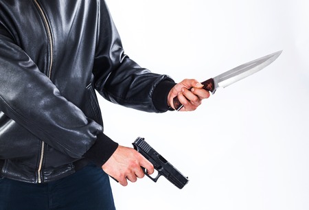 ナイフの分離の白い背景を刺す手に準備ができて の写真素材 画像素材 Image