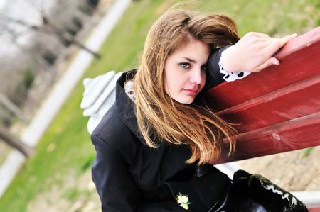 sad lonely: sad girl on the bench in the park