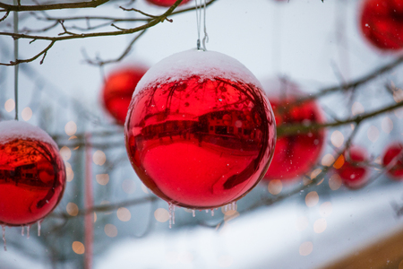 colorful reflective christmas ball ornaments outdoor with snow and icicles outdoor photo during advent against - Outdoor Christmas Ball Ornaments colorful reflective christmas ball ornaments outdoor with snow and icicles outdoor photo during advent against - Outdoor Christmas Ball Ornaments