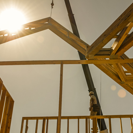 roof truss company placing new home wood engineered trusses on a residential construction site stock photo - 84 Lumber Roof Trusses roof truss company placing new home wood engineered trusses on a residential construction site stock photo - 84 Lumber Roof Trusses