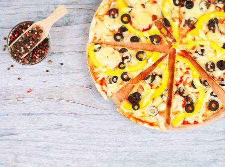 horizontal food banner with cut pizza and copyspace on wooden horizontal food flyer