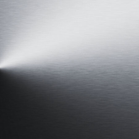 silver metal background chrome texture and beam of spot light stock chrome texture