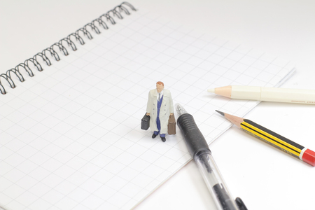 a small business toy figure with the stationery stock photo picture