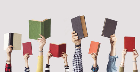 The hands of people hold books Foto de archivo - 102252983