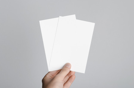 a6 flyer postcard invitation mock up male hands holding blank flyers