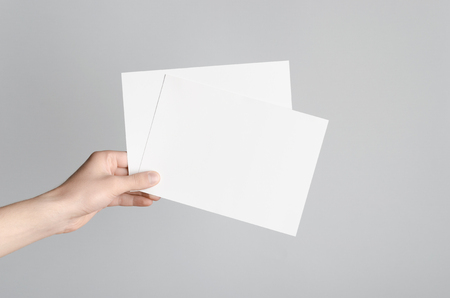 a5 flyer invitation mock up male hands holding blank flyers blank flyers
