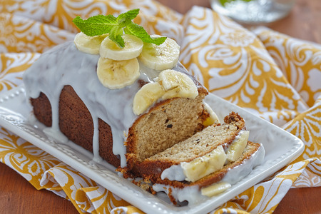banana: Banana bread with chocolate chips on wooden table