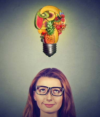 eating healthy idea and diet tips concept woman looking up at