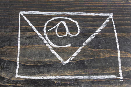 E mail sign handwritten with chalk