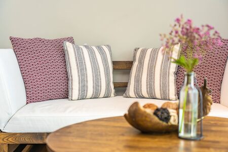 Flower Vase On Table With Pillow On Sofa Decoration Interior