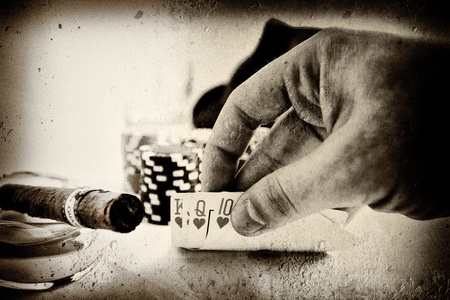 vintage conceptual poker hand image - 8559679