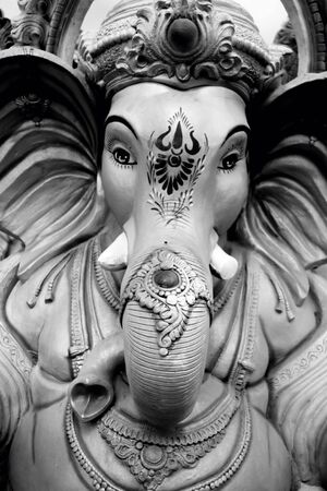 Hindu god lord ganesha statue in black and white