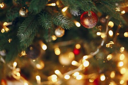 beautiful stylish christmas tree with garland lights and golden ornaments space for text seasonal - Christmas Tree With Garland beautiful stylish christmas tree with garland lights and golden ornaments space for text seasonal - Christmas Tree With Garland