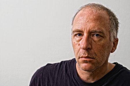 beautifully detailed real portrait of haggared tired looking adult white man looking intensely at the viewer