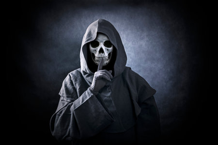 Grim reaper showing hush sign