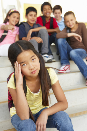 Girl being bullied in school - 33604150