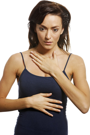 Young woman looking shocked and worried.