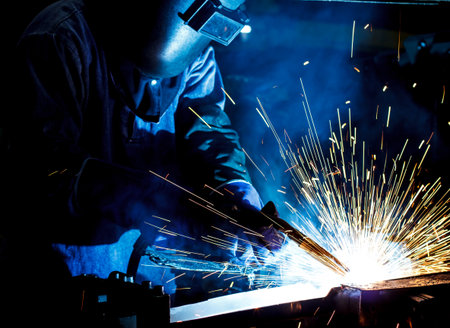 Industrial steel welder in factory - 38113418