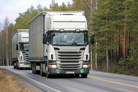 Salo Finland March 17 2017 Two White Scania R420 Curtainsider Salo Finland March 17 2017 Two White Scania R420 Curtainsider Semi Trailer