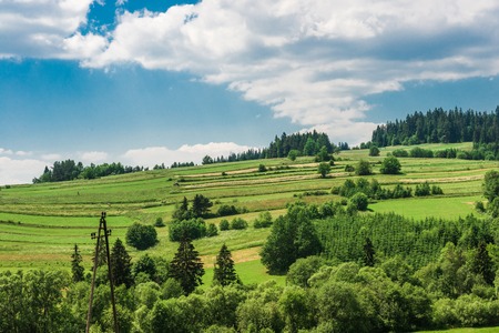 Green field under the beautiful clouds