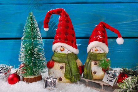 Christmas Decoration With Two Funny Santa Claus Figurines On Blue Wooden Background Stock Photo 33885729 Christmas Decoration With Two Funny Santa Claus Figurines On Blue Wooden Background Stock Photo 33885729