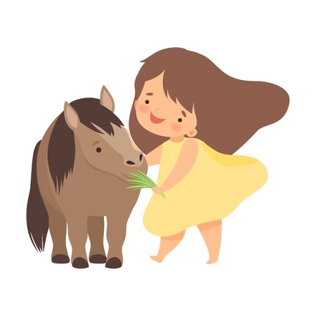 Cute little girl feeding pony with grass, adorable kid caring for animal at farm cartoon vector illustration on white background. Stock Photo