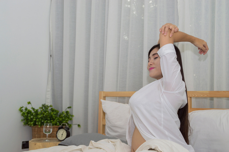 Wake up in the morning of pregnant women. Stock Photo