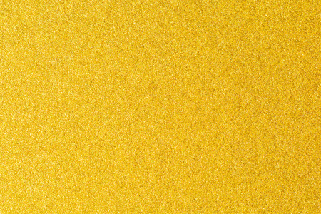 details of golden texture background gold color paint wall stock