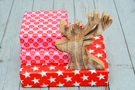 nice christmas gifts with reindeer of wood stock photo picture and royalty free image image 34122428 - Nice Christmas Gifts nice christmas gifts with reindeer of wood stock photo picture and royalty free image image 34122428 - Nice Christmas Gifts