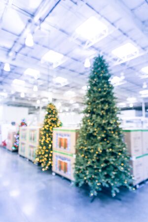 Blurred Image Huge Christmas Trees Decoration In Wholesale Store