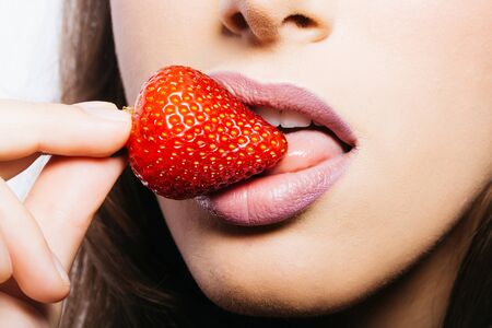 Sexy Female Mouth With Pink Lipstick On Lips Eating And Licking With Tongue Red Sweet Strawberry Sexy Female Mouth With Pink Lipstick On Lips Eating And Licking With Tongue Red Sweet Strawberry