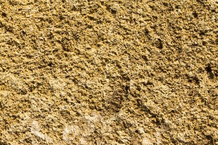 the texture of the stone wall of the porous surface horizontal