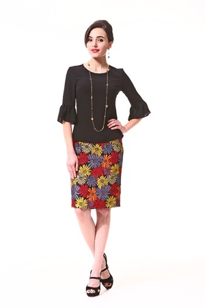 Asian Woman With Up Do Hair Style In Patchwork Skirt And Black Blouse High Heels Shoes Asian Woman With Up Do Hair Style In Patchwork Skirt And Black Blouse High Heels Shoes