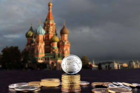 New coin of the russian ruble on the background of moscow, soft blurred background. high quality photo 版權商用圖片