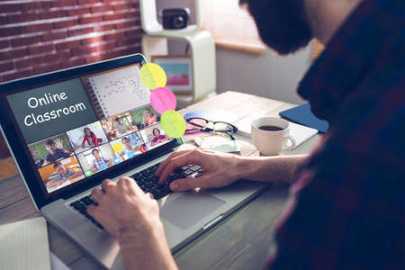Photography apps against midsection of creative editor typing on laptop