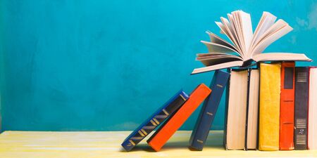 Books on wooden desk table and abstract background education background copy space back to school Stock Photo