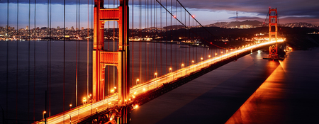 Night scene with golden gate bridge and san francisco lights
