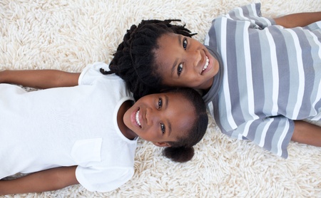 Brother And Sister On Floor With Heads Together Stock Photo 10108310 Brother And Sister On Floor With Heads Together Stock Photo 10108310