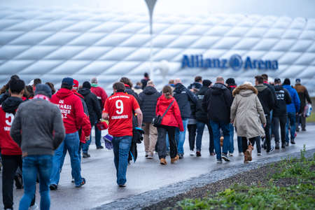 Munich, Germany - Oct 05, 2019: Fans Of Famous Football Soccer Club Fc Bayern Mã¼nchen Playing In German Bundesliga And Champions League Walking To Allianz Arena Home Stadium