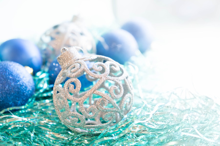 blue and silver xmas ornaments on bright holiday background with space for text merry christmas - Blue And Silver Christmas Ornaments blue and silver xmas ornaments on bright holiday background with space for text merry christmas - Blue And Silver Christmas Ornaments