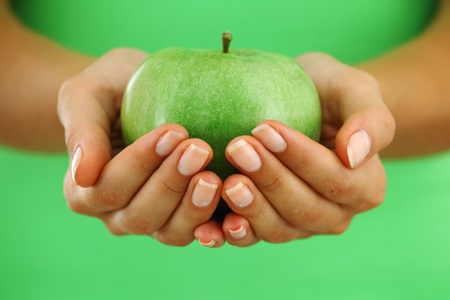 apple in woman hands close up Photo libre de droits