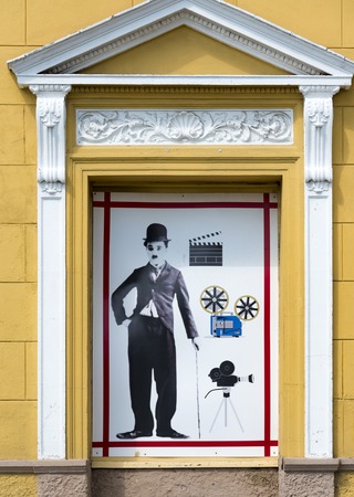 Conrado Benitez Cinema theater in Plaza San Francisco, Sancti Spiritus, Cuba. Antique design with image of Charlie Chaplin on the facade of the building. The theater is named after a voluntary teacher Conrado Benitez Garcia, who also served as an informa Editorial