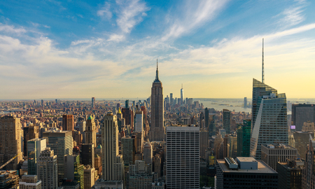 New york city skyline with urban skyscrapers at sunset