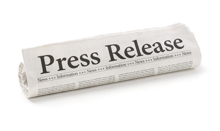 press release: Rolled newspaper with the headline Press Release